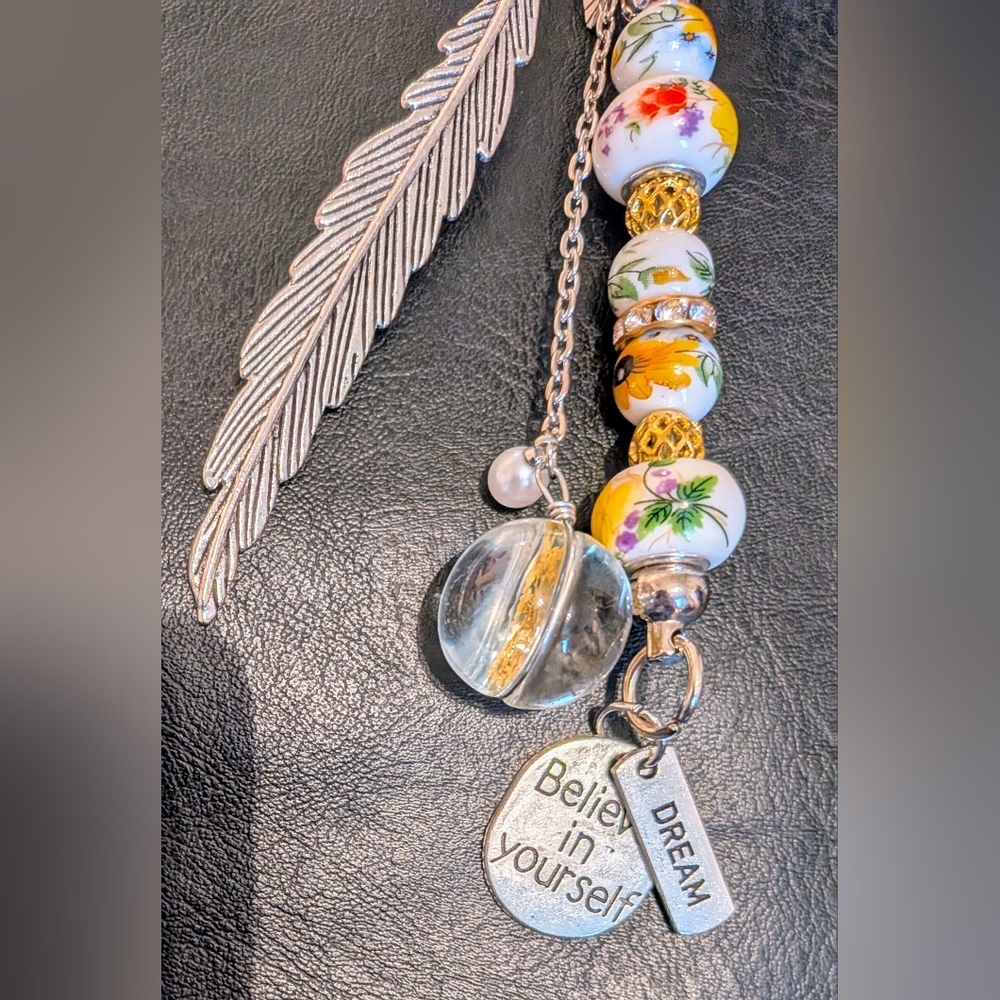 Floral Purse/Key Charm Charm with Silver Feather Says " Believe In Yourself"